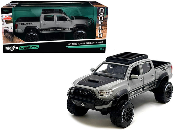 2023 Toyota Tacoma TRD PRO Off Road Pickup Truck Cement Gray with Black Hood and Roofrack "Maisto Design" Series 1/27 Diecast Model by Maisto