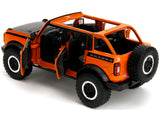 2021 Ford Bronco Open-Top Orange with Black Stripes and Hood with Extra Wheels "Just Trucks" Series 1/24 Diecast Model by Jada