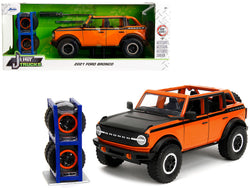 2021 Ford Bronco Open-Top Orange with Black Stripes and Hood with Extra Wheels "Just Trucks" Series 1/24 Diecast Model by Jada