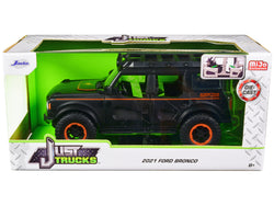 2021 Ford Bronco Matte Black with Orange Stripes and Roof Rack "Addictive Desert Designs" "Just Trucks" Series 1/24 Diecast Model by Jada